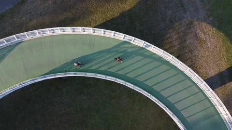 Rising view of curved bike path Video stock 201445190