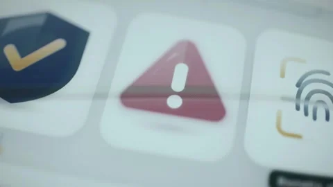 Risk alert warning activates beside security controls Stock Footage 346595554