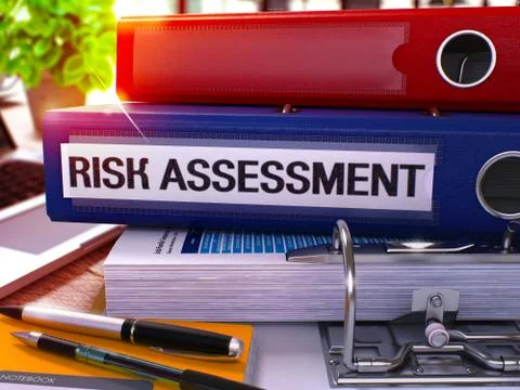 Risk Assessment on Blue Office Folder. Toned Image Illustrazione stock