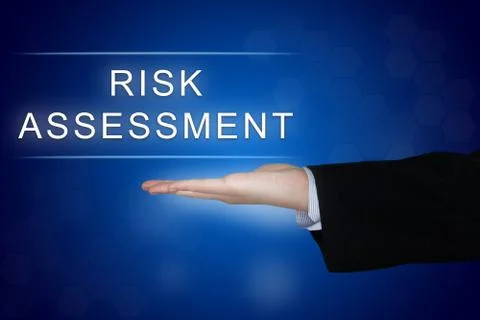 Risk assessment button on blue background Stock Photos