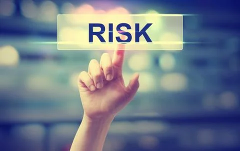 RISK concept with hand pressing a button Foto stock
