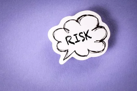 RISK concept. Speech bubble with text on purple background Stock Photos