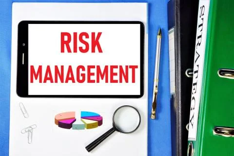 Risk management-lettering on a tablet PC. Analysis of the probability Stock Photos