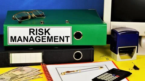 Risk management. Text label on the planning folder. Stock Photos
