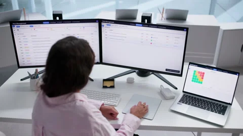 Risk Manager Analyzing Financial Data On Laptop Stock Footage 346329230