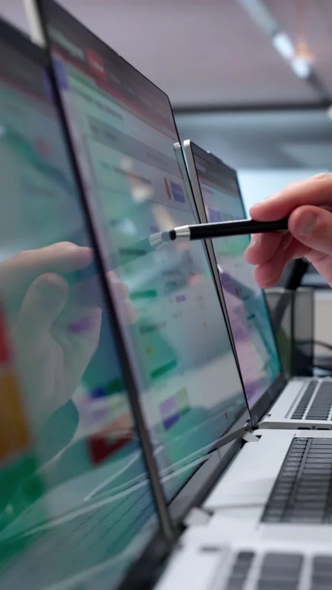 Risk Manager Carefully Analyzing Financial Data On Laptop Stock Footage 339892655