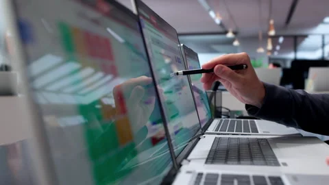 Risk Manager Carefully Analyzing Financial Data On Laptop Stock Footage 340397910