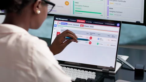 Risk Manager Carefully Analyzing Financial Data Stock Footage 345316321