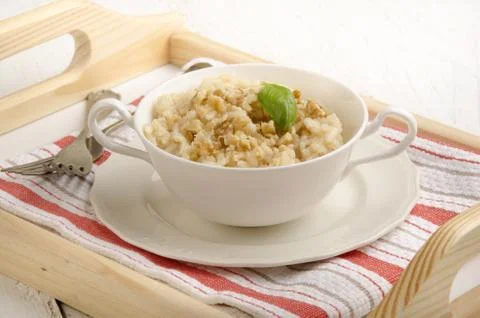 Risotto rice with walnut and basil Stock Photos