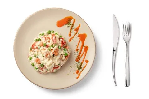 Risotto served on white table Stock Photos