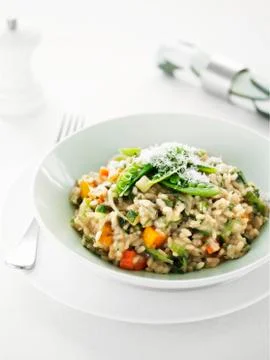 Risotto with spring vegetables Stock Photos