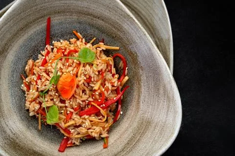 Risotto with vegetables on plate Stock Photos