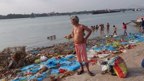 Ritual bathing in the Holy  polluted river Ganges, Stock Footage 179072962