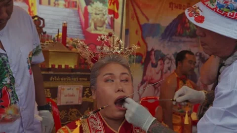 Ritual Piercing Performance During Vegetarian Festival in Phuket Stock Footage 345537069