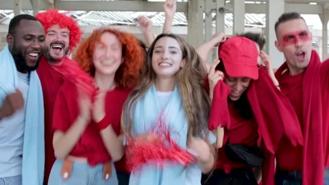 Rival sport fans screaming while supporting their teams out of the stadium Stock Footage 155492611