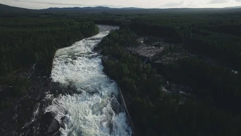 River Aerial 4k - Rapid Waters in Moody Forest Valley - Sweden Nature Stock Footage 116893735