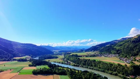 River aerial with puffy clouds Stock Footage 312640959