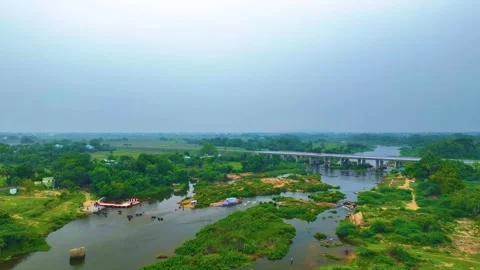 River and Bridge - Approaching Shot By a Drone Stock Footage 254276500
