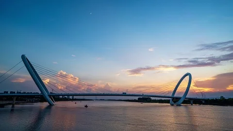 River and bridge sunset time lapse Stock Footage 113648681