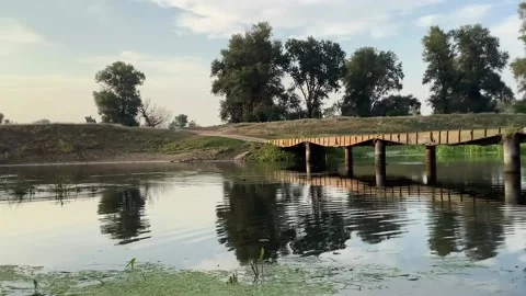 River and bridge. Water mirror Stock Footage 159505889
