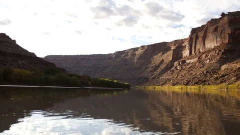 River and cliff reflection Stock Footage 82541800