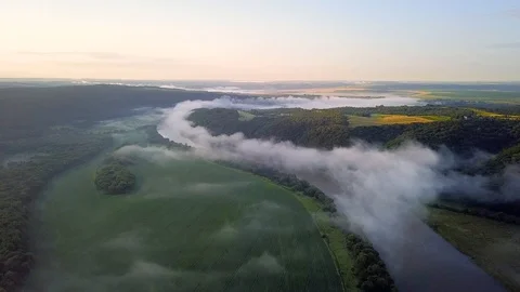 River and field in the mist during sunrise Stock Footage 91927077