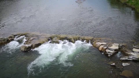 River and rapids. A beautiful view of the churning water, the mouth of the river Stock Footage 274473683