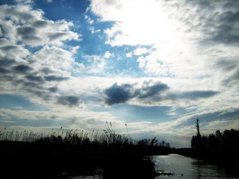River And The Sky With Clouds Stock Photos