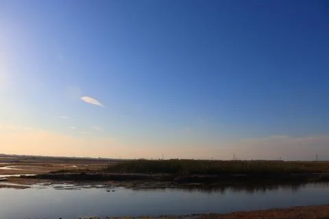 River and sky during sunset Stock Photos