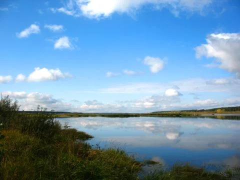 River and sky Stock Photos