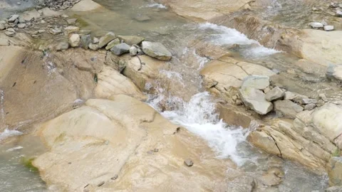 The River And Small Rapids, In The Woods From The Mountains Flow Beautifully The Stock Footage 161985040