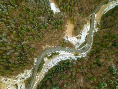 River and Snow in the Spruce Forest. Aerial View Stock Photos