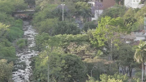 River and street view of the westside of Cali, Colombia 1 Stock Footage 88482152