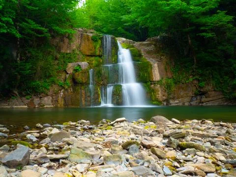 The river and waterfall in spring Stock Photos