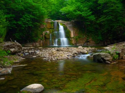 The river and waterfall in spring Stock Photos