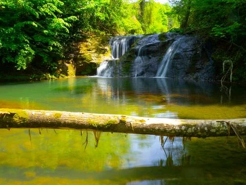 The river and waterfall in spring Stock Photos