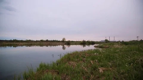 River in the background factory with pipes Stock Footage 76792238