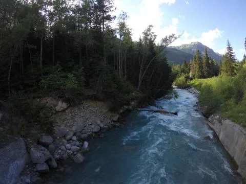 River in the background of a mountain Stock Photos