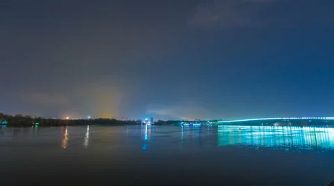 The river on the background of the night city. Time lapse Video stock 62257963
