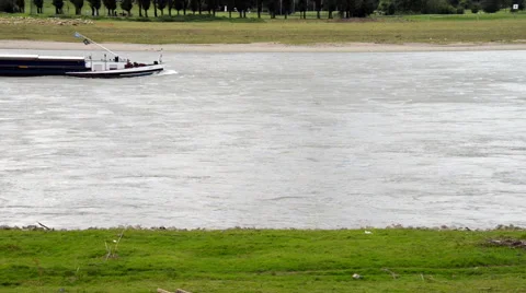 A river barge cruising up the stream Video stock 41340142