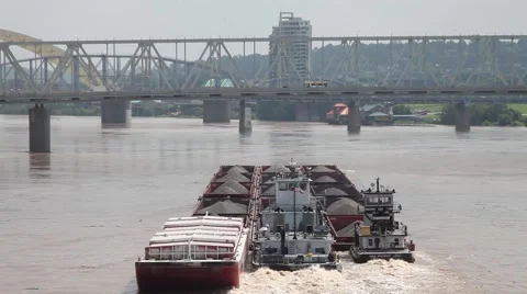 RIVER BARGE FILLED WITH GRAVEL PUSHED BY TUGS ON OHIO RIVER Stock Footage 59184059