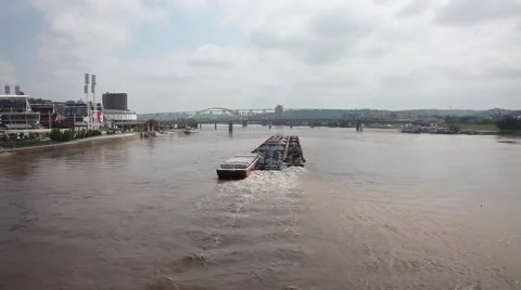 RIVER BARGE,  FILLED WITH GRAVEL, PUSHED BY TUGS ON OHIO RIVER Stock Footage 59184060