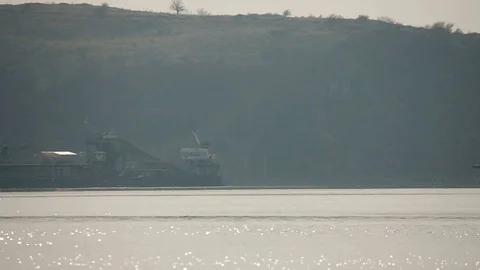 River barge ship slowly passing by on Danube river Stock Footage 103474153