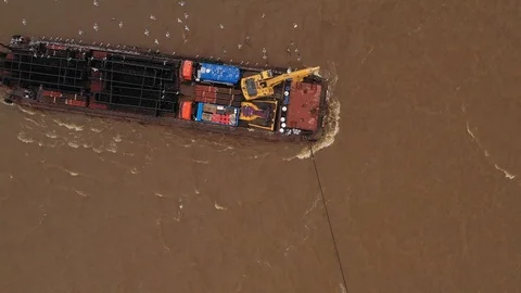 The river barge on the tow floats down the river Ob. Stock Footage 120588090