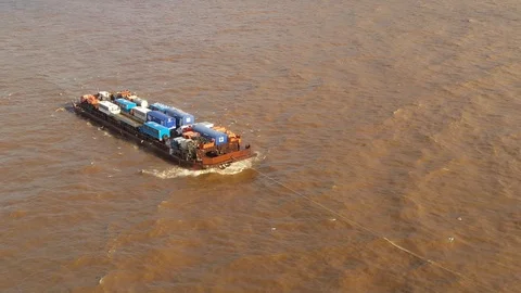The river barge on the tow floats down the river Ob. Stock Footage 120588184