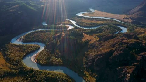 River Bed Meanders Horseshoe In Valley Of Mountain Canyon With Rocks Sunset Rays Stock Footage 160534890