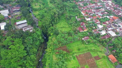 River bed with a small waterfall, in the center of Baturraden, Indonesia Stock Footage 341674185