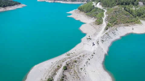 The river bed is a top view from the drone. Flying, green. Stock Footage 130399170