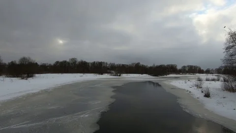 The river begins to melt with the arrival of spring (melting ice on the river) Stock Footage 87192999