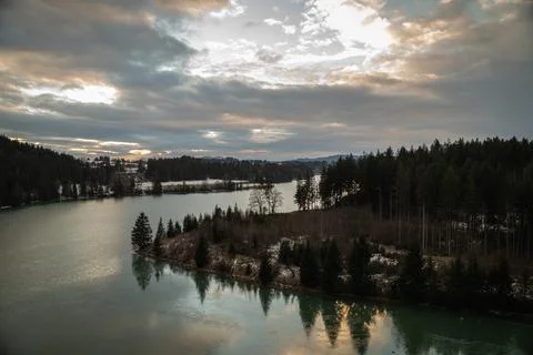 River bend with forest and sunset Stock Photos